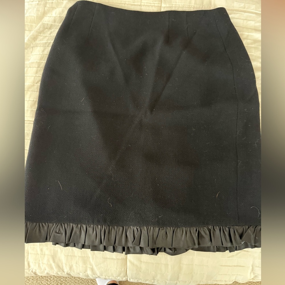 Black wool Skirt with flirty party trim